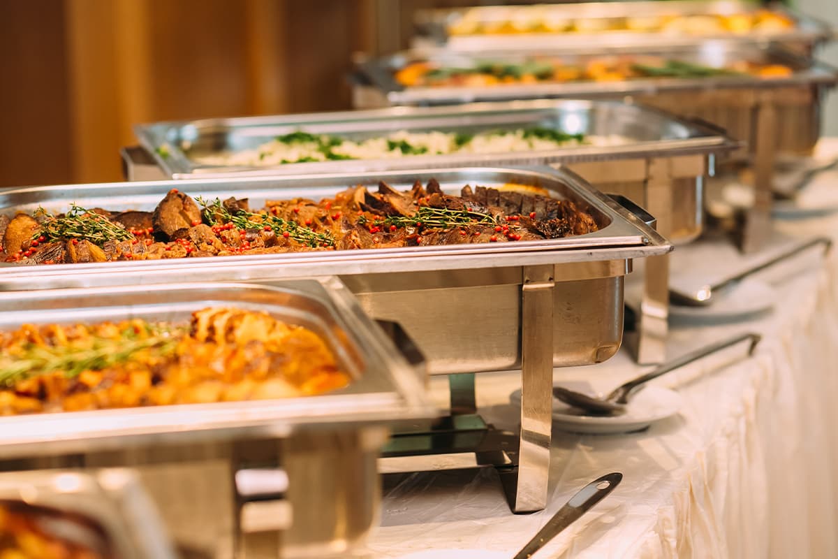 Professional buffet catering setup at Crooked Creek Golf Club featuring hot entrée selections for weddings, banquets, tournaments, and special events.