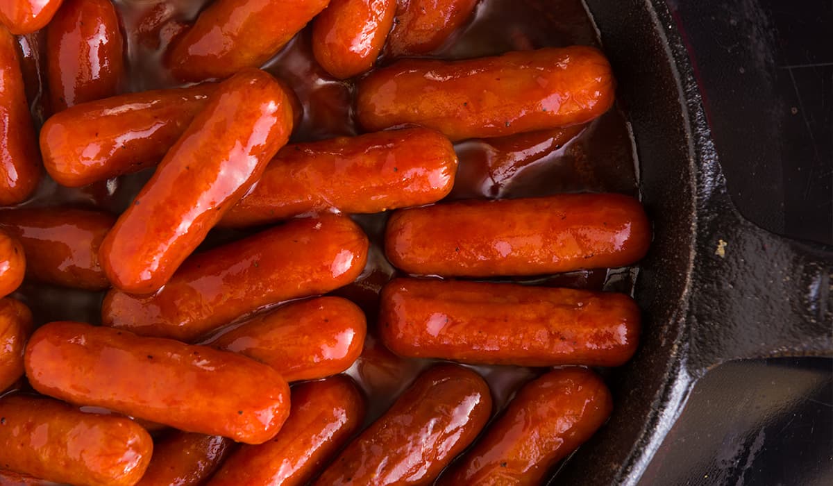 Cocktail sausages smokies glazed in savory barbecue sauce, served as a popular appetizer option for events at Crooked Creek Golf Club.